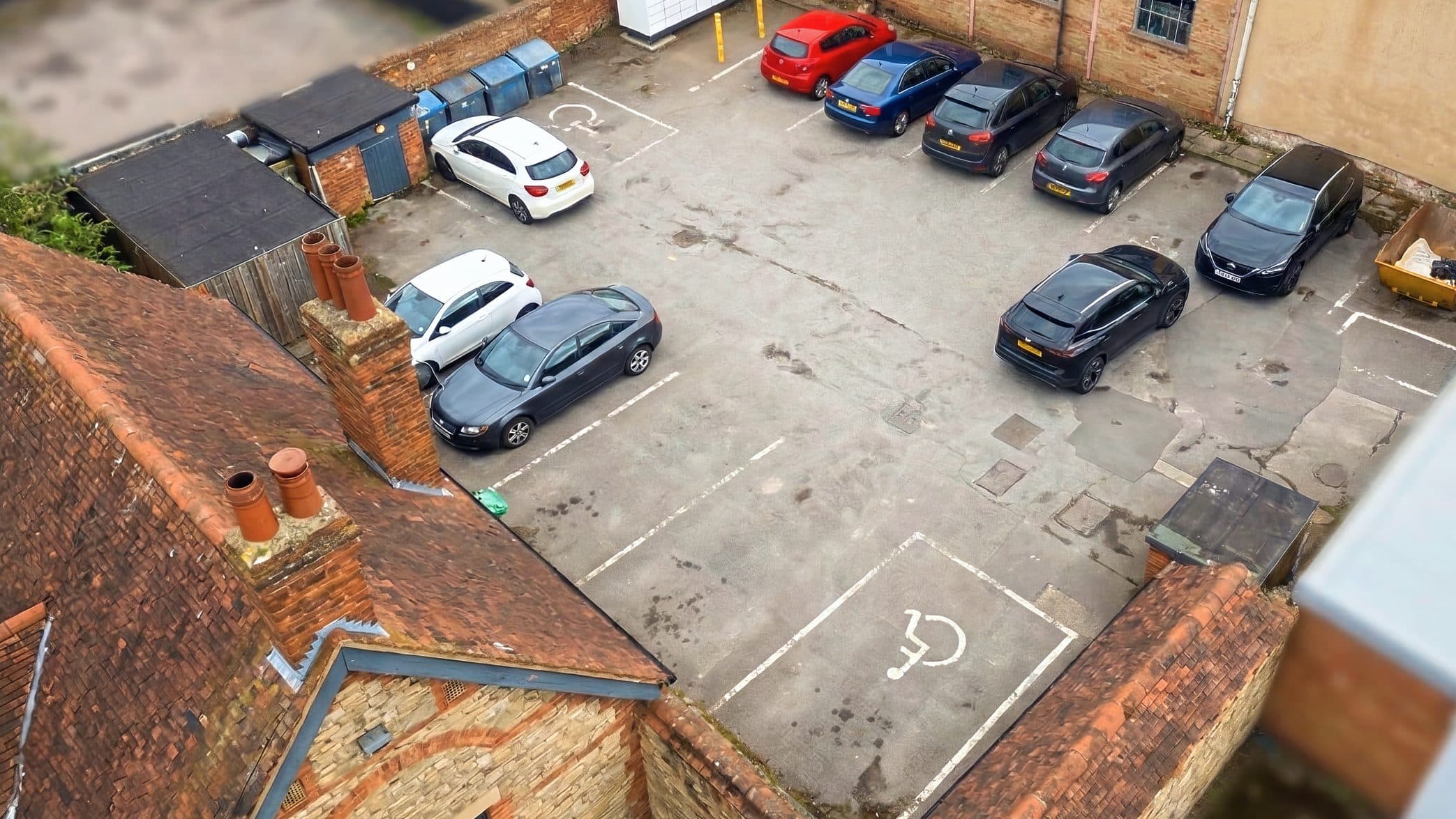 Customer parking area at The Old School House pub in Stony Stratford.