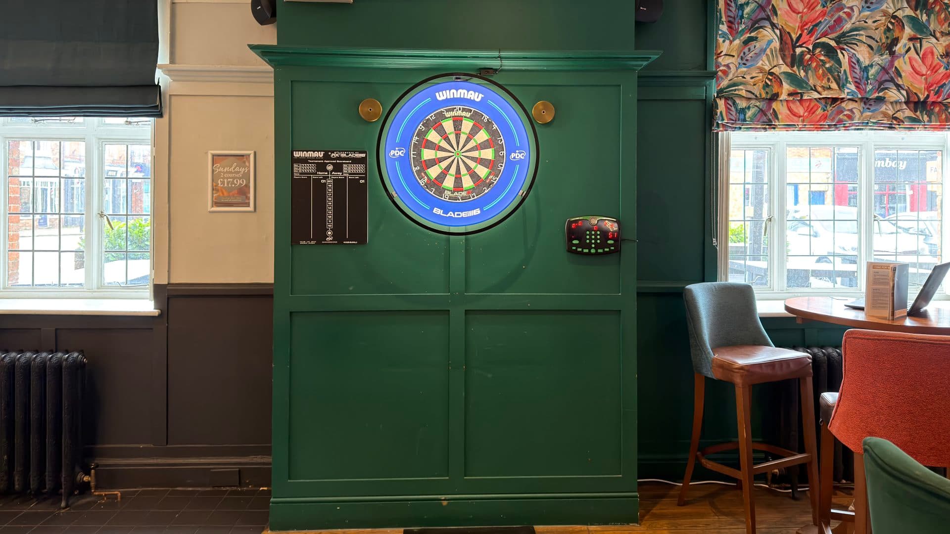 Dart board area inside The Old School House pub in Stony Stratford.