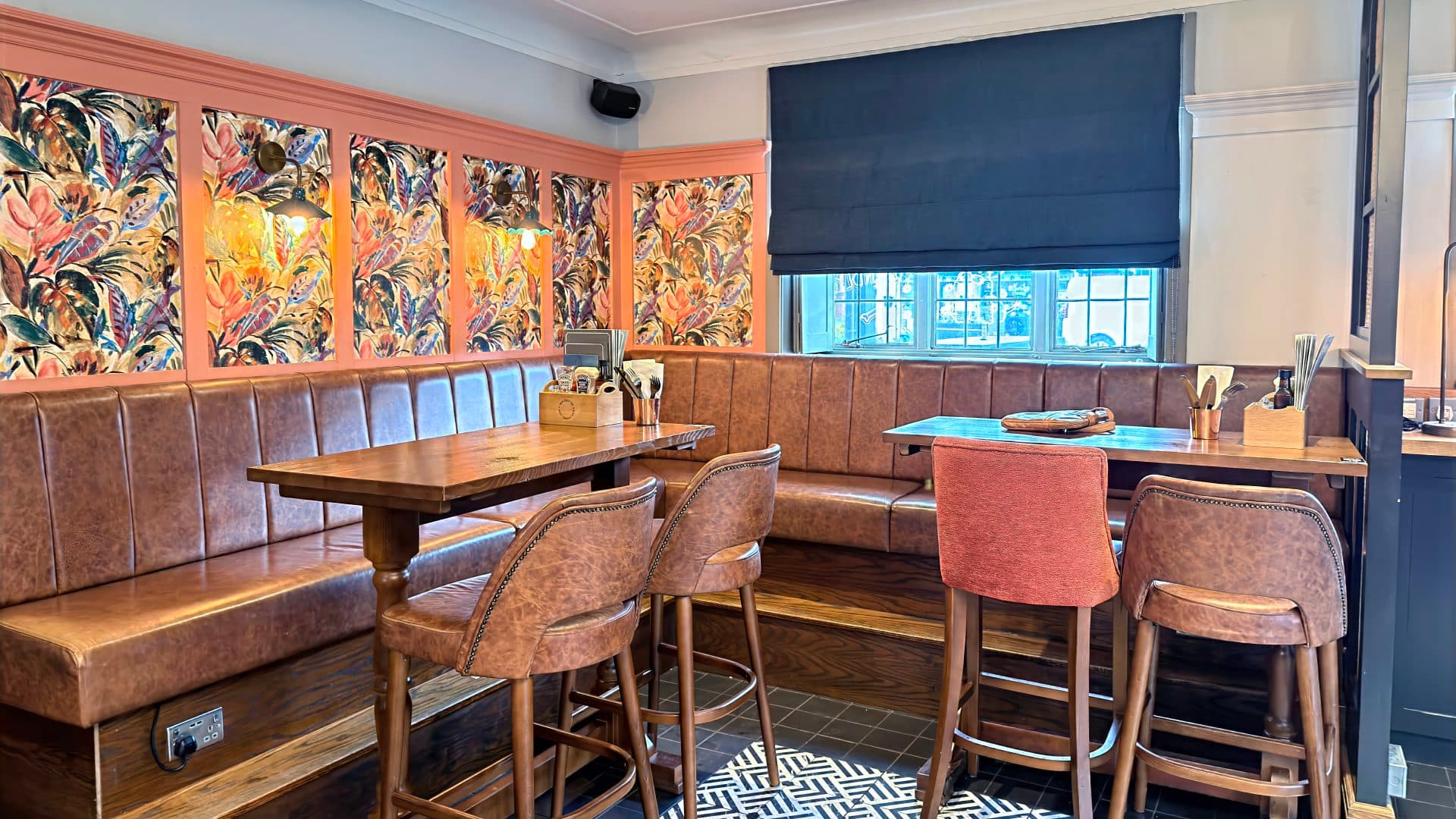 Indoor seating area at The Old School House showing the room layout and pub atmosphere.